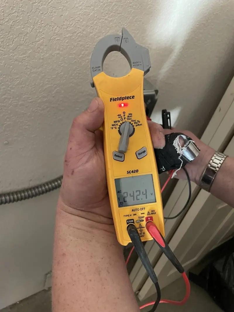 Voltage testing with clamp meter during Whole House Surge Protector in LaGrange